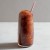 Szklanka z napojem mrozonym Slushy Cola ze slomka