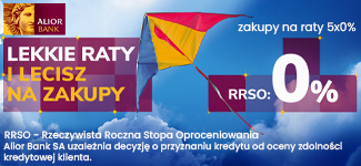 Baner reklamowy Alior Banku z kolorowym latawcem na tle nieba, promujący zakupy na raty 5x0% z RRSO 0%. Zawiera hasło LEKKIE RATY I LECISZ NA ZAKUPY oraz notę prawną na dole grafiki.