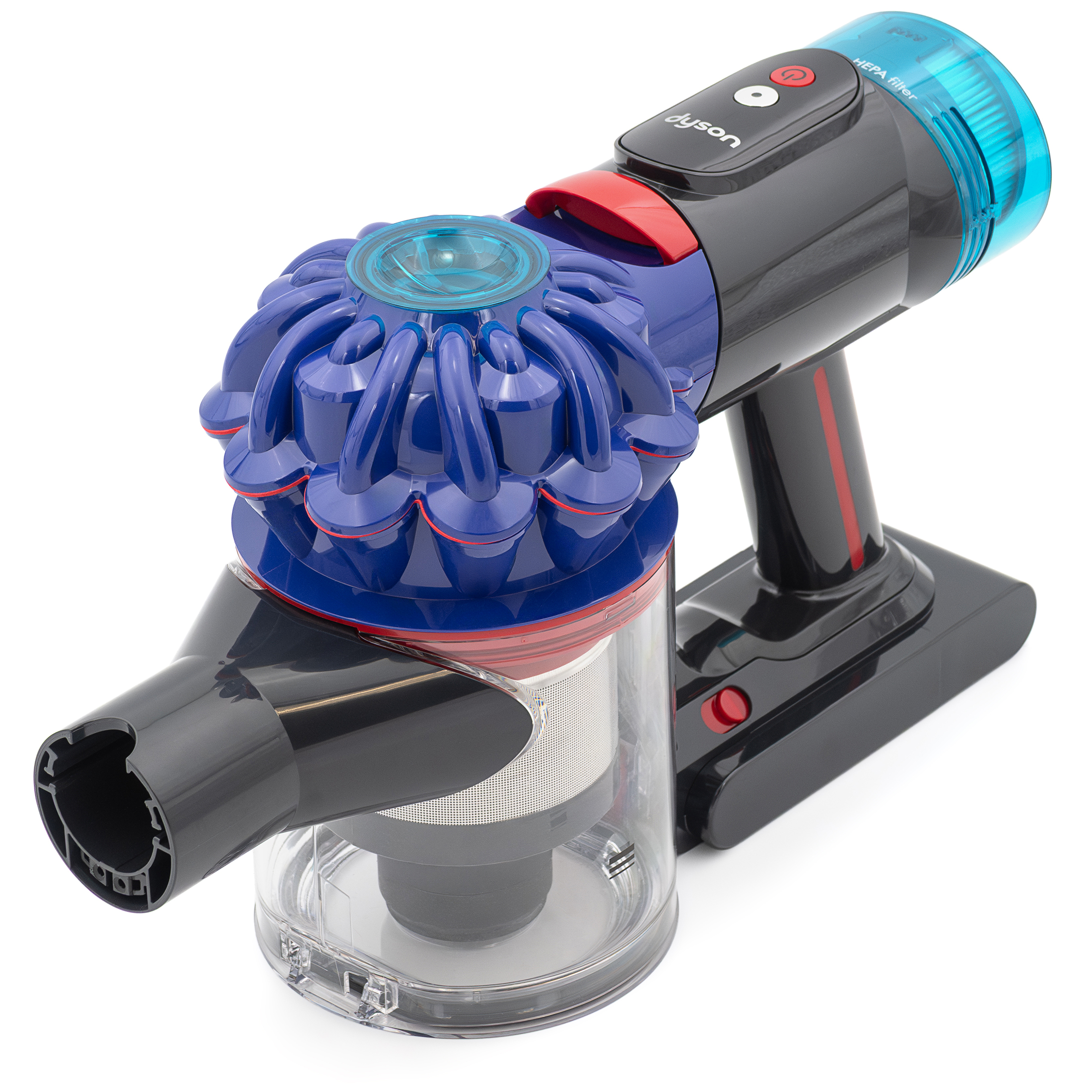 Korpus odkurzacza bezprzewodowego Dyson V10 Konical ułożony ukośnie na białym tle. W górnej części widoczny jest ciemny uchwyt z czerwonym włącznikiem i białym napisem dyson oraz pionowy niebieski filtr HEPA. Poniżej znajduje się niebieski element cyklonowy oraz przezroczysty pojemnik na kurz z wystającą czarną rurą ssącą.