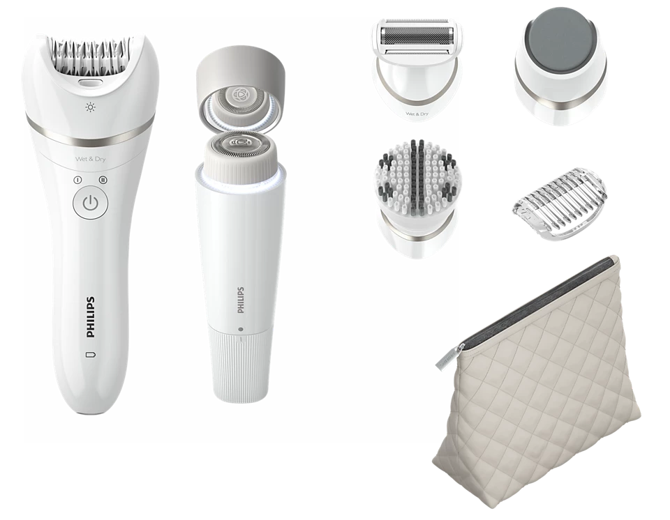 Zestaw depilatorów do ciała Philips BRE770/92, rozłożony na części. W zestawie depilator z nakładkami, golarka, pędzelek i pikowana kosmetyczka.