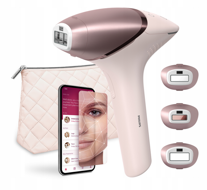 Depilator Philips Lumea 9900 BRI977/00 SenseIQ w kolorze różowego złota z białą rączką, z kosmetyczką, smartfonem z aplikacją i trzema nakładkami.