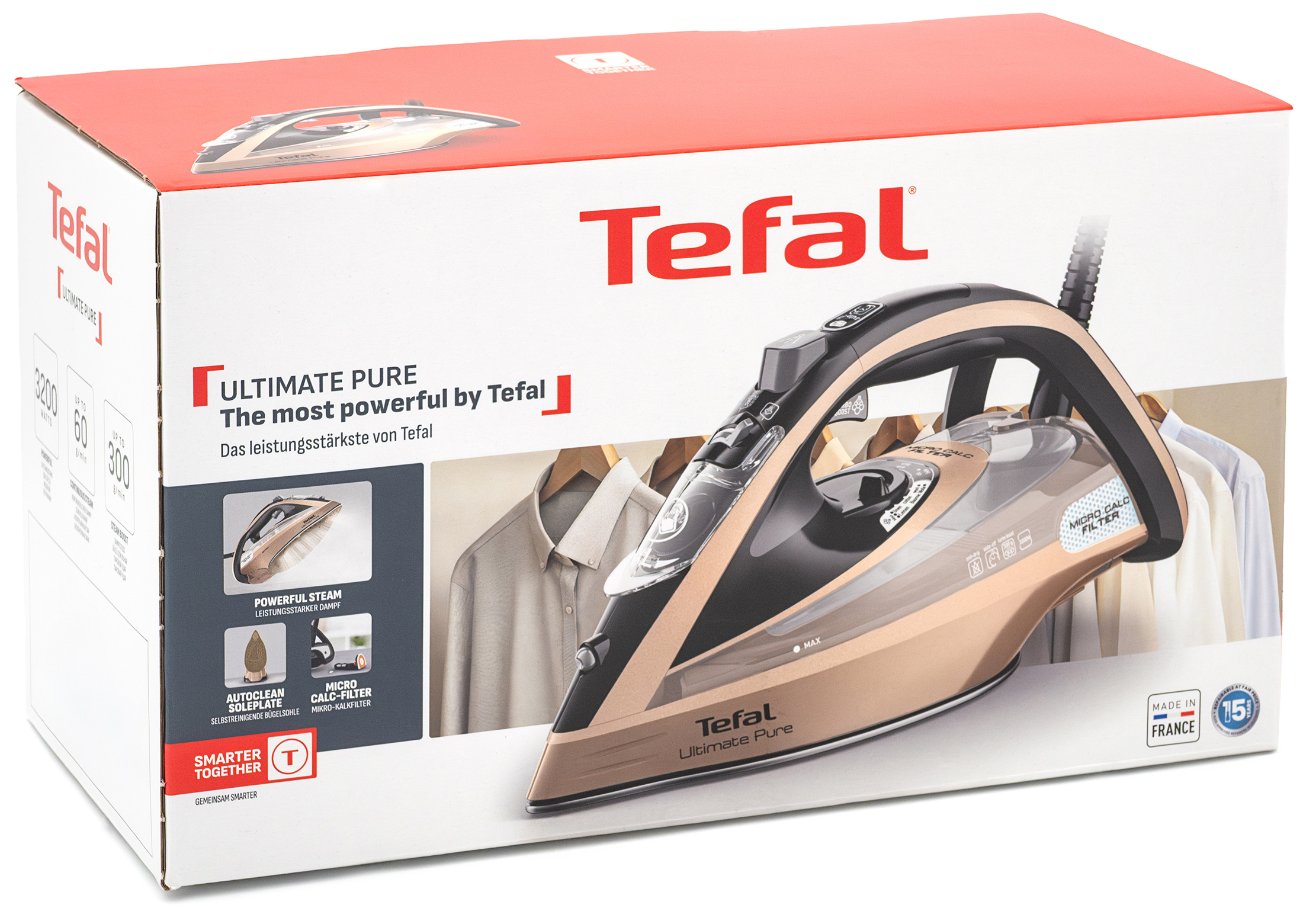 Kartonowe opakowanie żelazka Tefal Ultimate Pure FV9852E0 z czerwoną pokrywą na białym tle. Widok na front pudełka z czerwonym logo Tefal, zdjęciem miedziano-czarnego żelazka, miniaturami głównych funkcji oraz oznaczeniem Made in France.