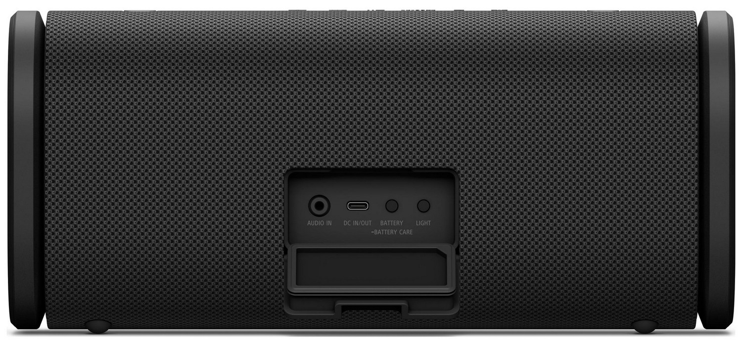 Widok na tył głośnika Sony ULT FIELD 5 z panelem złącz. Widoczne są gniazda Audio In, USB-C (DC IN/OUT) oraz przyciski kontroli baterii i oświetlenia. Panel jest osadzony w czarnej obudowie z siatki z tworzywa, nad gumową klapką ochronną.