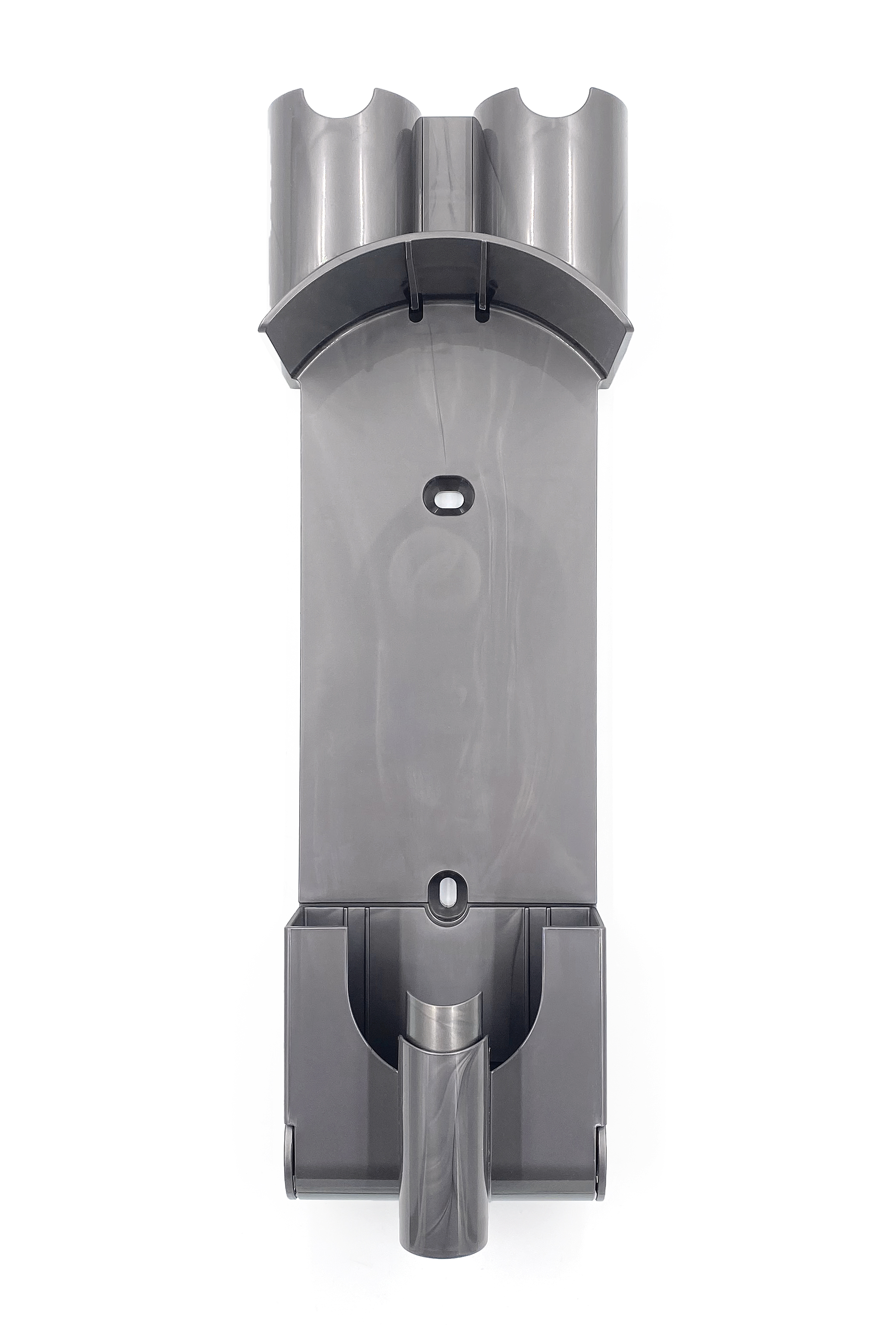 Szara stacja dokująca do odkurzacza Dyson V8 Advanced, służąca do mocowania na ścianie. Ma prostokątny kształt, mocowanie na górze i miejsca na akcesoria na dole.