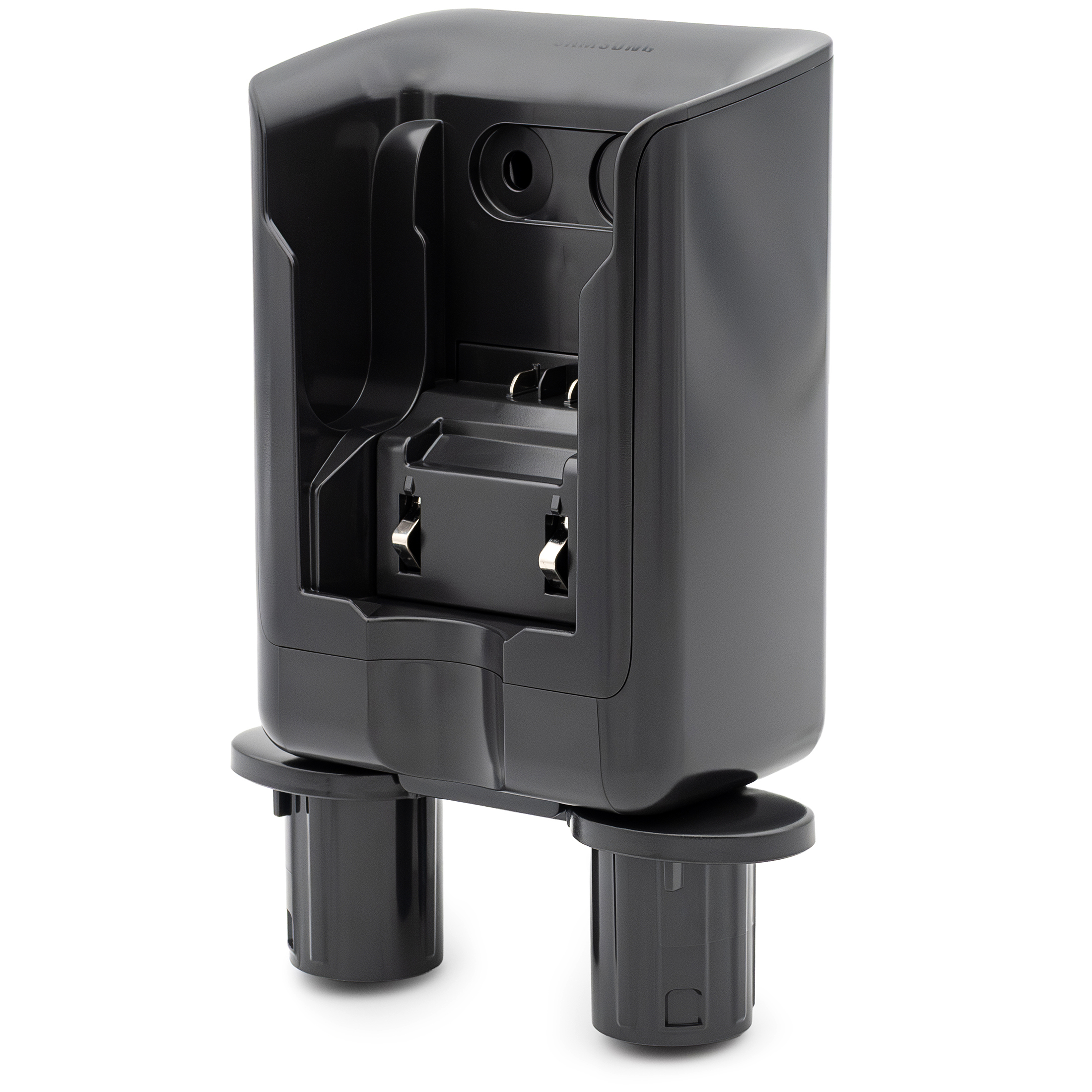 Czarna stacja dokująca 2w1 do odkurzacza Samsung Jet 65 Pet z widocznymi stykami ładowania i tłoczonym logotypem. U dołu znajdują się dwa dedykowane uchwyty na akcesoria. Produkt zaprezentowany na białym tle.