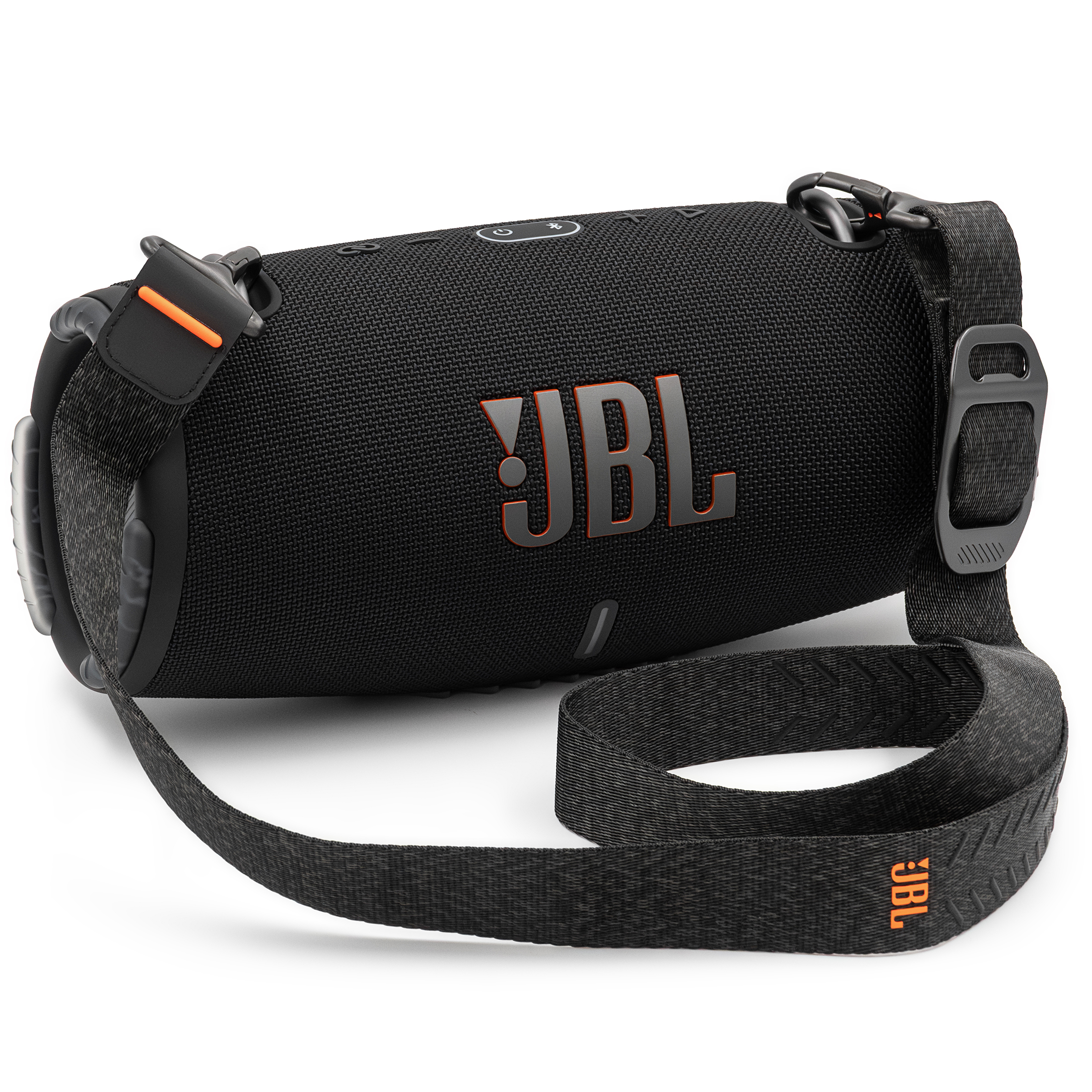 Czarny głośnik przenośny JBL Xtreme 3 leżący na boku na białym tle, z widocznym panelem sterowania na górze i materiałowym paskiem.